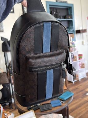 Coach Brown Signature Canvas Sling Bag with Black and Blue Stripes